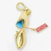 European And American Fashion Gold-Plated Can Open Mussel Pendant Niche Design Sense Letter Square Brand Bag Pendant Female - Image 2