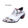 OVXUAN Men Skull Punk Western Cowboy Boots Mens Fashion Designer 6CM High Heel Wedge Leather Shoes White Pointed Ankle Boots Men - Image 2