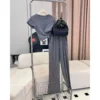 Two Piece Set Of New Korean Style Trendy Hot Diamond Short Sleeved Top Flared Pants Set For Women's Fashion 2024 High Waisted - Image 3