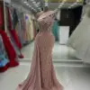 2024 Nude Pink Mermaid Evening Dresses with Side Satin Tail Pearls Crystals Prom Party Gowns for Black Girls Custom Made Robes