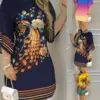 Women's Vacation Dress 2024 Summer Latest European and American Short Sleeved Round Neck Fashionable Printed Beach Skirt